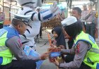 Penyuluhan Tertib dan Patuh Berlalu Lintas dengan Pertunjukan Angklung