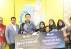 AXA Mandiri Serahkan Manfaat Perlindungan Jiwa Sebesar Rp 2 M