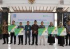Dibiayai APBD, 704 Anggota BPKal se-Kabupaten Sleman Terima Kartu BPJS Ketenagakerjaan
